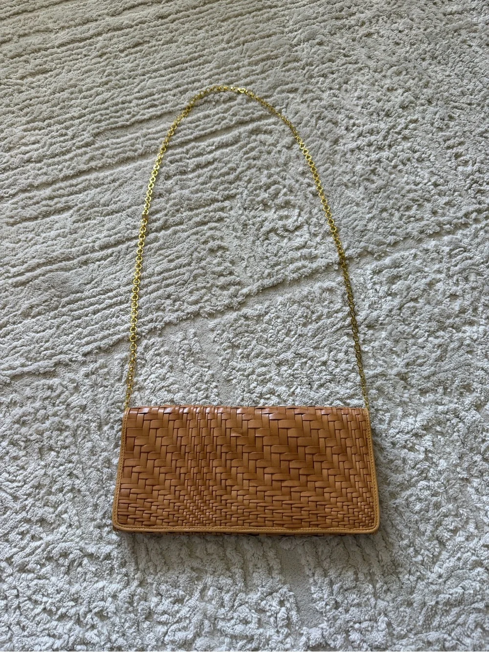 Cole Haan's iconic Genevieve woven leather tan crossbody bag